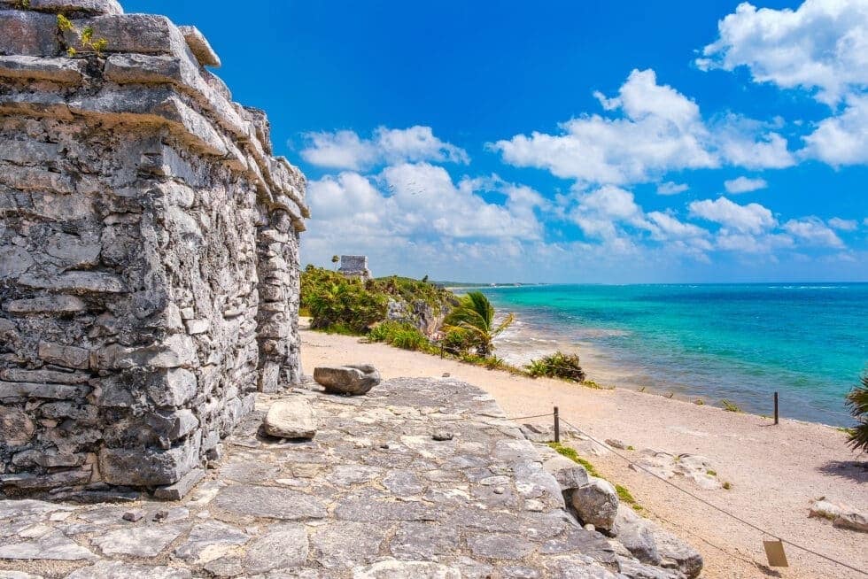 Mayan Ruins Stone Temple with travel context for Boardwalk Resort Vacations.